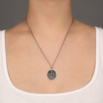 Load image into Gallery viewer, Heart of the Wolf silver talisman
